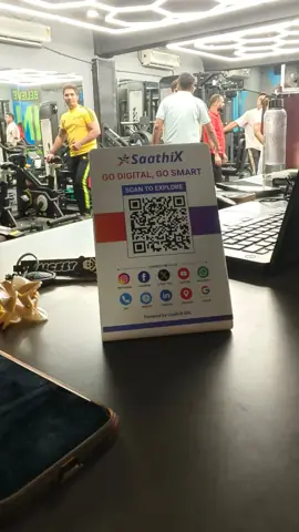 SaathiX QR stand at a gym reception