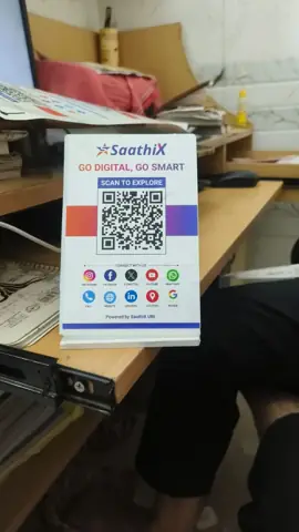 SaathiX QR stand on a shop counter